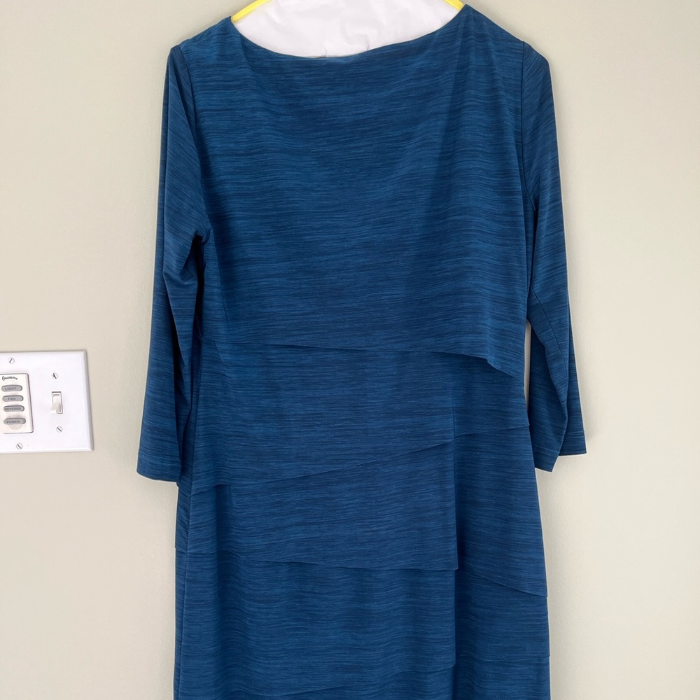 Three quarter sleeve knee length tiered dress
